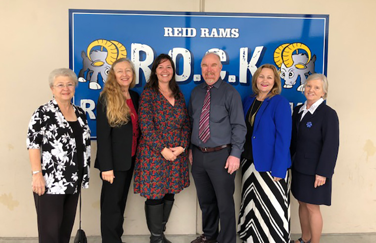 Board Members with Mrs. Helenihi and Dr. Johnson at Reid School